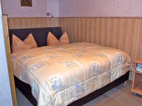 Ein Bett oder Betten in einem Zimmer der Unterkunft Ferienhaus Clausnitz ERZ 071