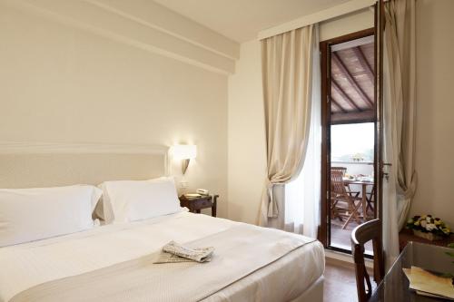 Ліжко або ліжка в номері Hotel Italia