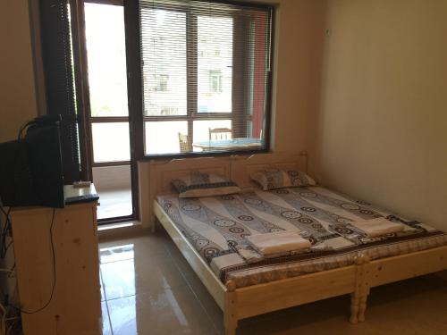 A bed or beds in a room at Apartment Martin Beach