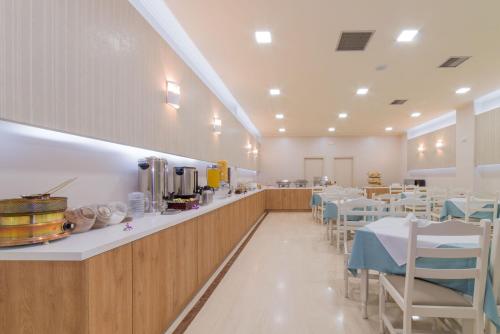 Restoran atau tempat lain untuk makan di Hotel Palmyra
