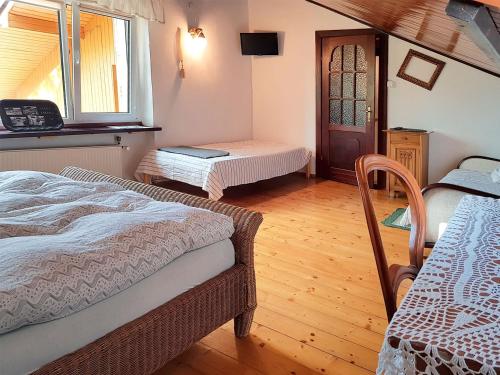 Postel nebo postele na pokoji v ubytování Villa Retro Możliwość wynajęcia całego budynku