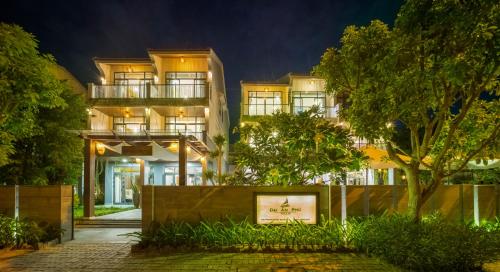 an exterior view of a building at night at Dai An Phu Villa in Hoi An
