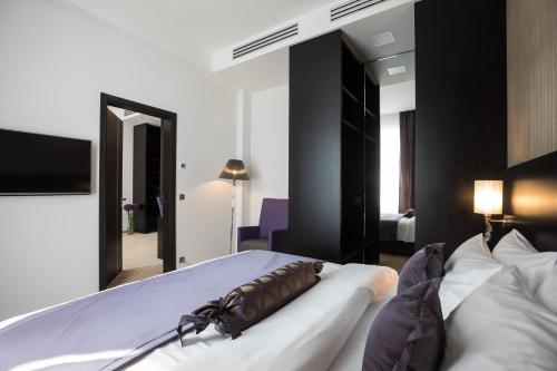 Ένα ή περισσότερα κρεβάτια σε δωμάτιο στο Myo Hotel Wenceslas