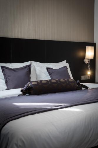 Ένα ή περισσότερα κρεβάτια σε δωμάτιο στο Myo Hotel Wenceslas