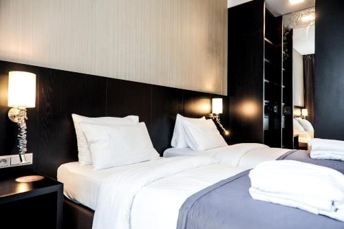 Ένα ή περισσότερα κρεβάτια σε δωμάτιο στο Myo Hotel Wenceslas