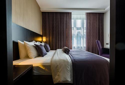 Ένα ή περισσότερα κρεβάτια σε δωμάτιο στο Myo Hotel Wenceslas