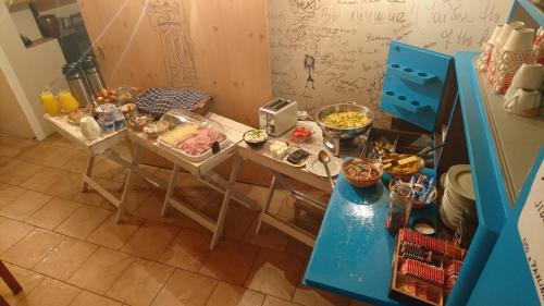 an overhead view of a kitchen with a table full of food at Penzion u Lupíků in Frýdlant nad Ostravicí
