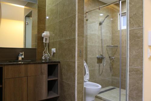 Koupelna v ubytování 德瑞旅店Direct Hotel