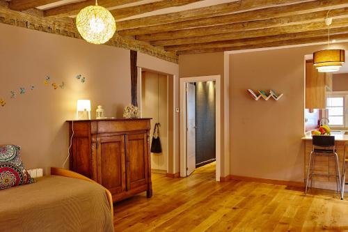 a bedroom with a bed and a wooden ceiling at Central Flat in Lekeitio