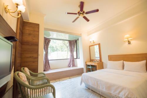 Hu Shan Hot Spring Hotelにあるベッド