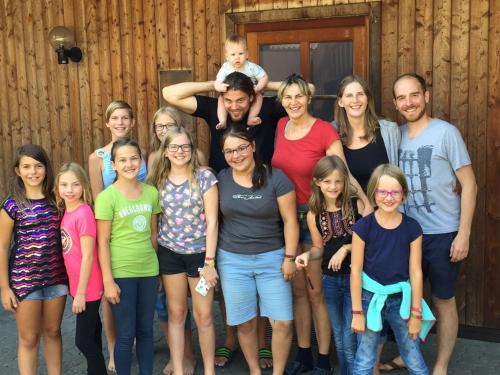 a large group of people posing for a picture at Espi-Stables Ferienhof Esterhammer in Liebenau