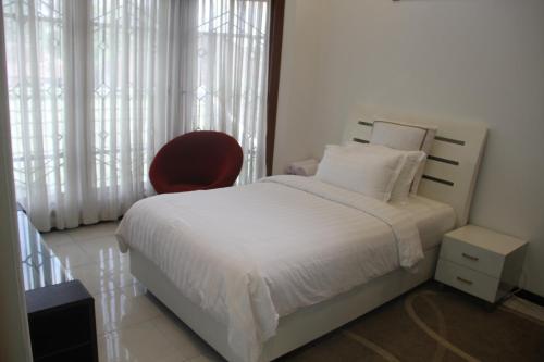 Кровать или кровати в номере Alsalam Syariah Guesthouse