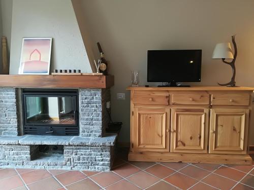 TV a/nebo společenská místnost v ubytování Relè B