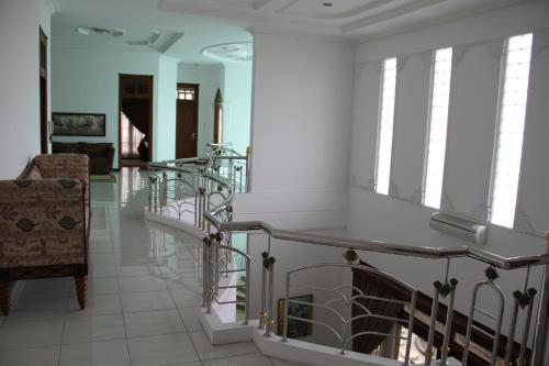 Гостиная зона в Alsalam Syariah Guesthouse