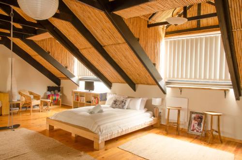Cama o camas de una habitación en Sundowner Loft