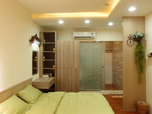 Katil atau katil-katil dalam bilik di Ji Shih Life Style Hotel