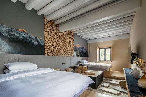 Postelja oz. postelje v sobi nastanitve Shangri-La Karesansui Hotel