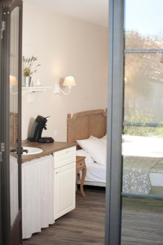 La Villa Dupont d'Avignonにあるベッド
