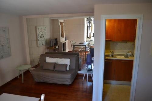 A kitchen or kitchenette at Palazzo Velli Suites