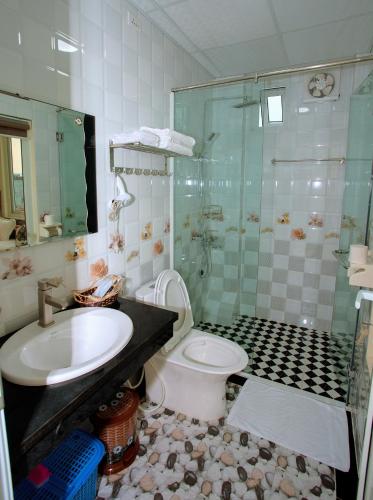 Salle de bains dans l'établissement Friendly Home Hotel