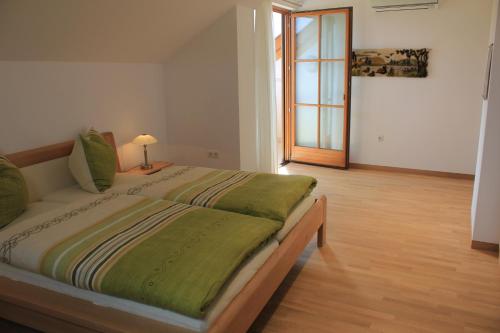מיטה או מיטות בחדר ב-Apartments Klotz