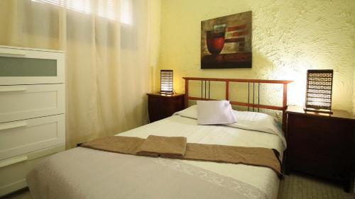Кровать или кровати в номере Callao Salvaje