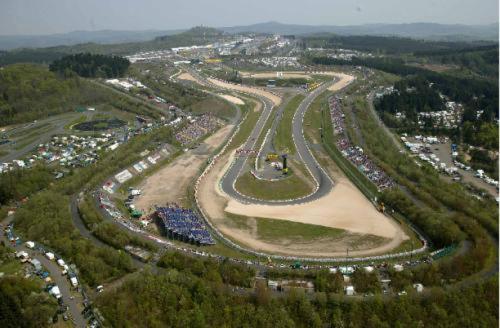 an aerial view of a race track with a lot of traffic at Hotel Rosenhof in Kerpen