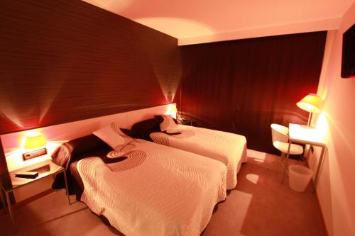 Katil atau katil-katil dalam bilik di La Suite Hotel