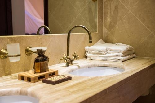 Ванная комната в Hotel Costa dei Fiori