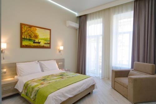 Postel nebo postele na pokoji v ubytování Summit Apart Hotel