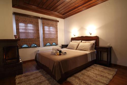 Un pat sau paturi într-o cameră la Hotel Petrotechno