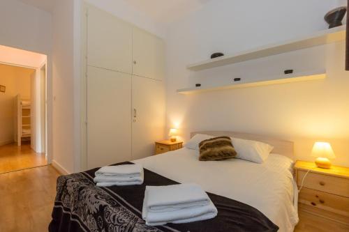 Voodi või voodid majutusasutuse Summit Apartment - Chamonix toas