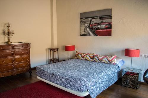 Cama ou camas em um quarto em L'ARGOLLA HOTEL-Pizzeria
