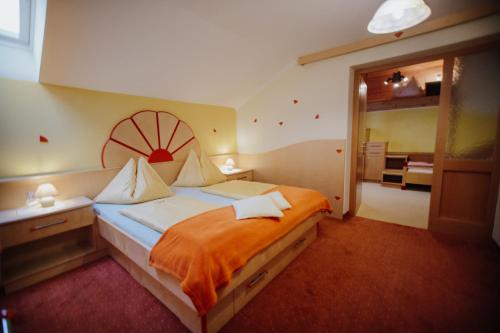 Katil atau katil-katil dalam bilik di Hotel Garni Zerza