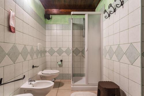 Kúpeľňa v ubytovaní Affittacamere Shardana