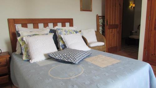 Katil atau katil-katil dalam bilik di Casa do Pinheiro