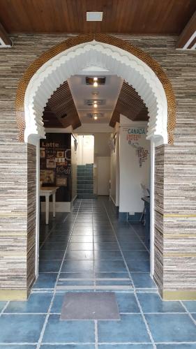 an entrance to a building with an archway at Mecasa Hotel in Boracay