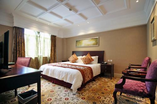 Ένα ή περισσότερα κρεβάτια σε δωμάτιο στο Shanghai Moller Villa Hotel - National Historic and Cultural Relics Protection Building