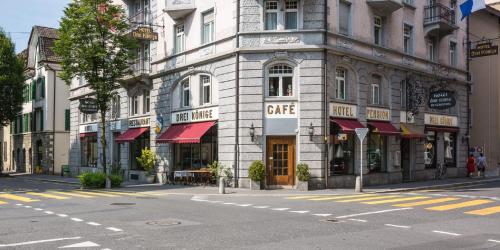 a building on the side of a street at Hotel Drei Könige Luzern in Lucerne