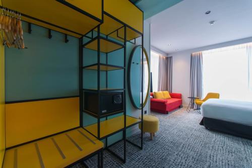 Postel nebo postele na pokoji v ubytování ibis Styles Tbilisi Center