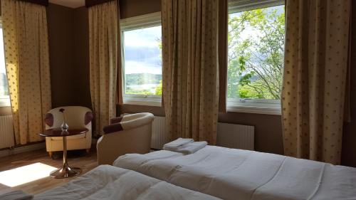Postel nebo postele na pokoji v ubytování Dagsholm Hotell