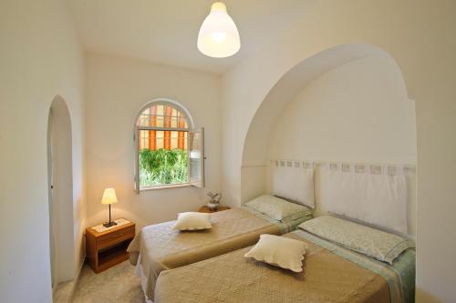 Кровать или кровати в номере La Scaletta