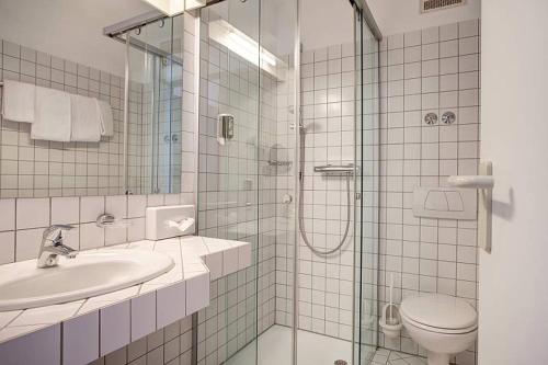 Koupelna v ubytování alfa hotel