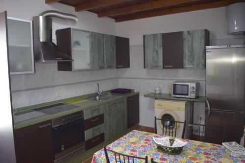 Dapur atau dapur kecil di Sol y Luna en Caleta de Fuste