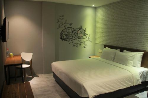 Katil atau katil-katil dalam bilik di Nite & Day Surabaya - Kedungdoro