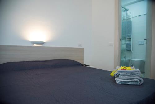 Posteľ alebo postele v izbe v ubytovaní Al Duomo B&B