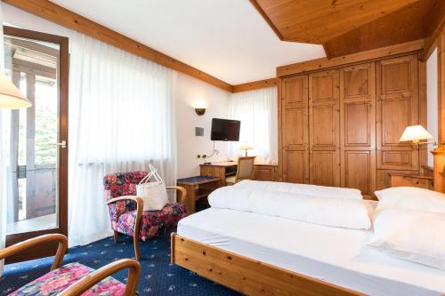 Postel nebo postele na pokoji v ubytování Residence MAYR