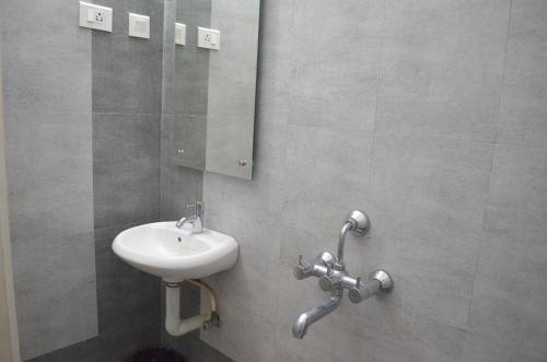 صورة لـ Blackroots Serviced Apartments في كويمباتور