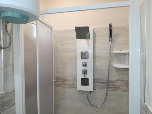 a shower in a bathroom with a shower at La Casa del Professore in Santa Teresa di Riva