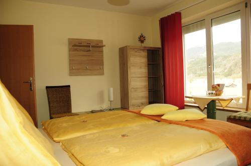 Katil atau katil-katil dalam bilik di Hotel Garni Zerza